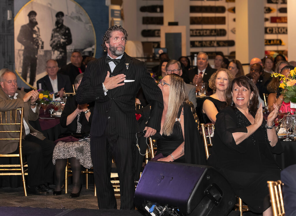 Guests applauding during the VersAbility 2025 Gala program at The Mariners’ Museum